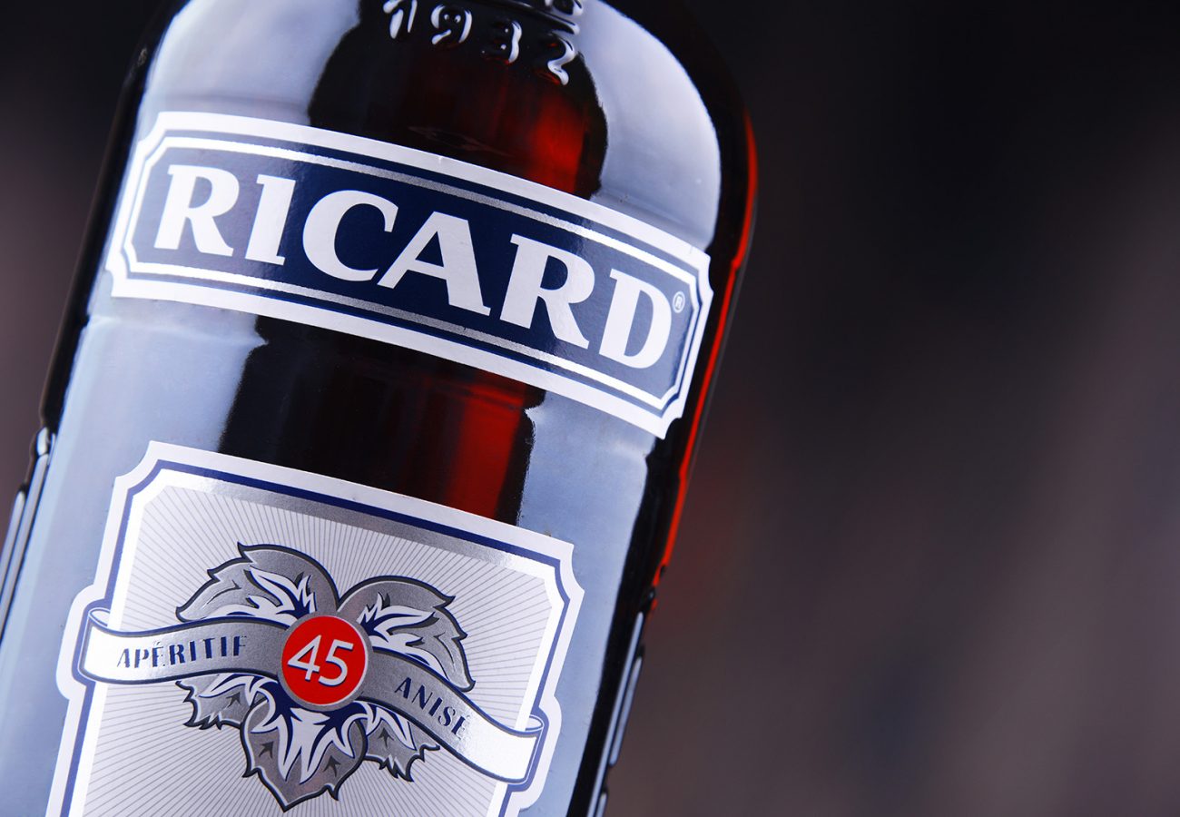 POZNAN, POL - AUG 8, 2018: Bottle of Ricard, a pastis, an anise and licorice-flavored aperitif, created by Paul Ricard in 1932